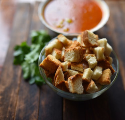 traditional tomato soup with herbs and croutons