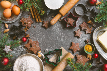 Festive winter background with chocolate shotbread and ingredients foe cookies
