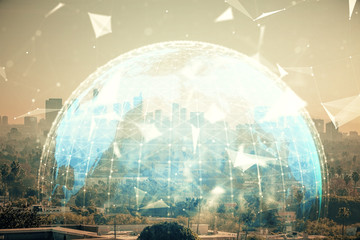 Fototapeta premium Double exposure of business theme hologram drawing and city veiw background. Concept of success.