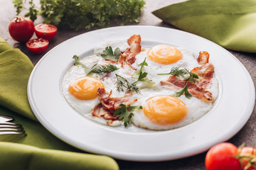 Perfect breakfast with bacon and eggs in the morning.