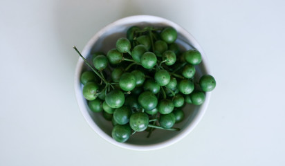 Leunca or Solanum nigrum on white background. 