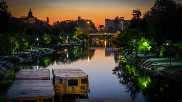 Romania , Timisoara night city photography boats on canal Bega river