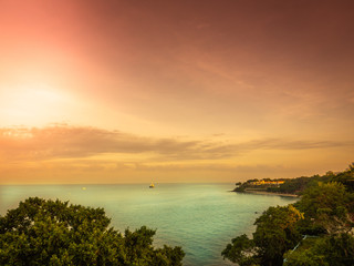 Fototapeta na wymiar Before sunset twilight sky and red green color sea at pattaya beach, Thailand.