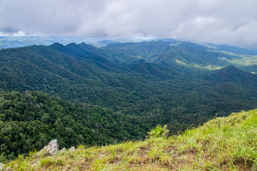 Fototapeta na wymiar Viewpoint and green fields in the rainy season at Doi Luang Tak, Tak Province,Thailand.