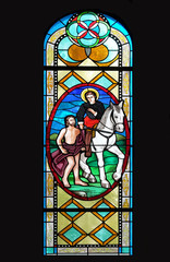 Saint Martin, stained glass window in the Shrine of the Queen of Peace in Hrasno, Bosnia and Herzegovina