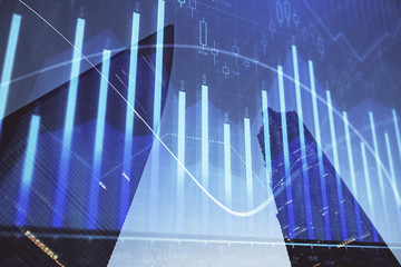 Forex chart on cityscape with tall buildings background multi exposure. Financial research concept.