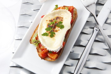 pincho, tapa de queso brie con verduras. skewer, brie cheese cover with vegetables.