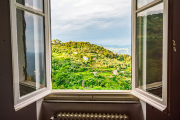 Open window with Tuscany view, Italy, Summer