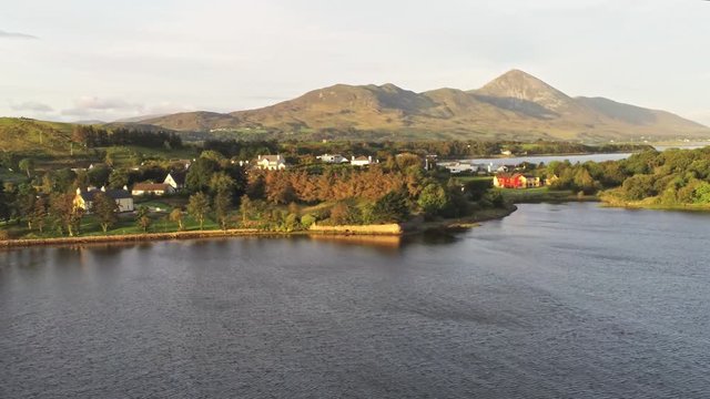 4k Aeroview of Westport harbour with Croagh Patrick mountain in background, Ireland