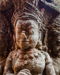 Fototapeta na wymiar stone carved cambodian figure 