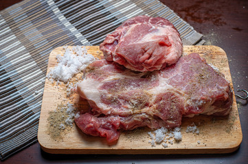 Fresh raw pork on Butcher and Bucket