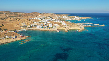 Aerial drone photo of famous sandy turquoise beach of Ammos and main port of Koufonisi island, Small Cyclades, Greece