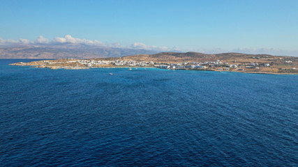 Aerial drone photo of famous sandy turquoise beach of Ammos and main port of Koufonisi island, Small Cyclades, Greece