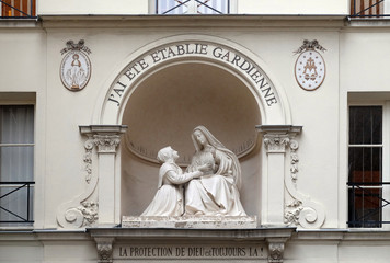 Statue of St Catherine and the Virgin Mary outside the Chapelle Notre Dame de la Medaille...