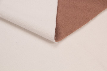 Multi-color fleece fabric. Fleece two-tone. The texture of the fleece bedspread