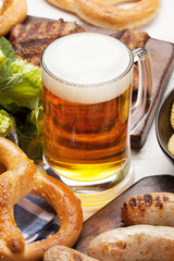 Oktoberfest set. Pretzels, sausages and lager beer
