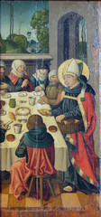 Fototapeta premium Louis is feeding poor people and pilgrims, altar of St. Louis of Toulouse in St James Church in Rothenburg ob der Tauber, Germany
