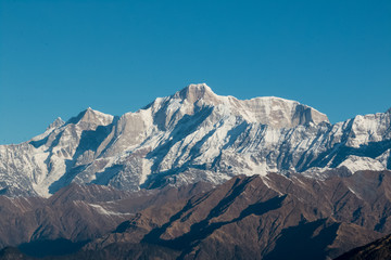 Fototapeta na wymiar Natural beauty of Uttarakhand with snow covered mountains in Chopta Valley