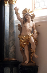 Saint Sebastian, altar statue in the church of St. Agatha in Schmerlenbach, Germany