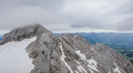 Fototapeta na wymiar Summer snow-capped mountains. The highest peak in Austria.