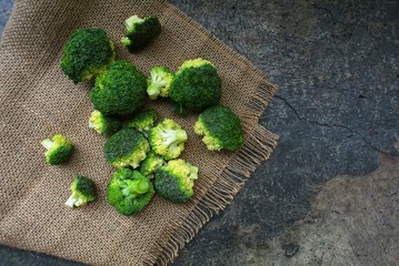 Fresh green broccoli on a sackcloth background
