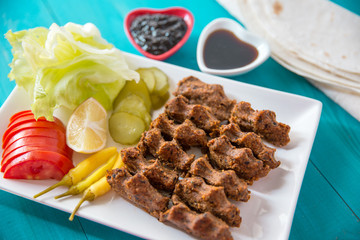 cig kofte, Turkish traditional food made with bulgur and raw meat