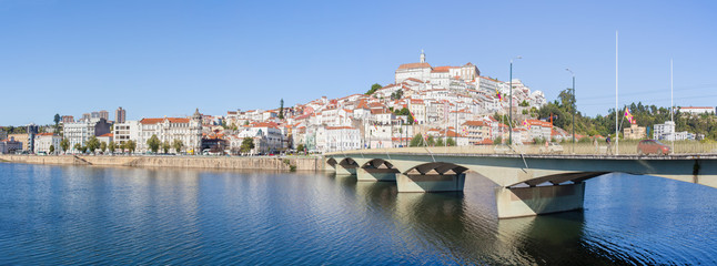 Santa Clara Bridge with the old town on the hill in the background. Coimbra, Portugal