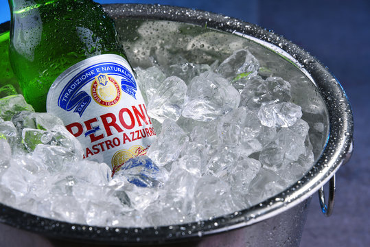 Bottle of Peroni Nastro Azzurro in bucket with crushed ice