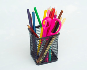 colored pencils in a pencil case, back to school, office tools
