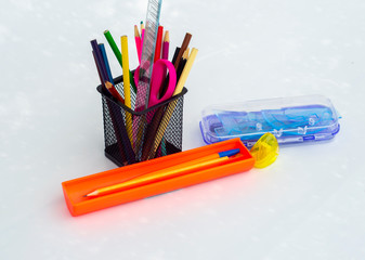 colored pencils in a pencil case, back to school, office tools