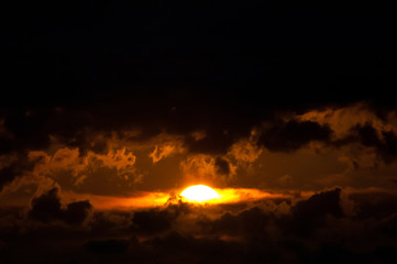 clouds silhouette on sunset background