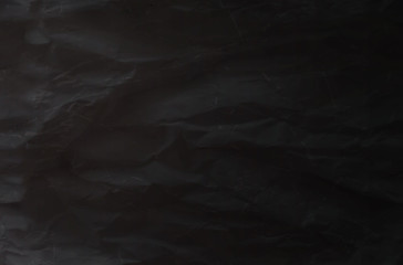 vector paper sheet pattern with a texture of cracks and scratches. old, worn, black paper in a realistic style. 3d design, background for text, advertising, business ideas.