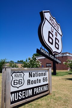 Elk City, Oklahoma - July 20, 2017: The Biggest Route US 66 Sign By The National Route 66 Museum In Elk City, Oklahoma. This Museum Complex Includes The Old Town Museum Which Displays The History Of E