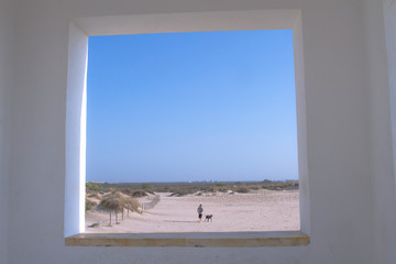 Window to a natural park at beach. Los toruños, Cadiz.