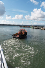 Port of Poole, southern England, UK. September 2019.  The Tug Polmear underway and working in Poole...