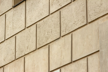 Close-up view of a gray brick wall (background)