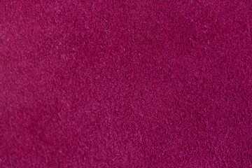 Burgundy suede surface. Backgrounds made of genuine leather.