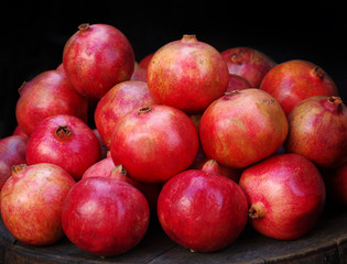 Fototapeta na wymiar pomegranate fruit on a dark background