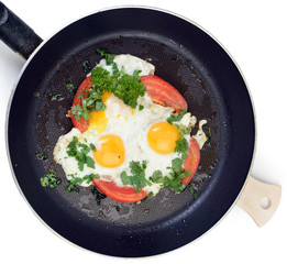Fried eggs in pan