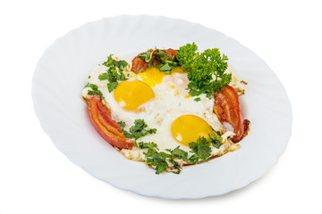 Fried eggs in plate isolated