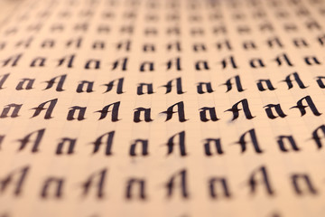 Calligraphic letter A learning skills paper page. Calligraphy letters A background. Lettering...