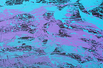 Painted wall with violet and blue splashes as background or texture