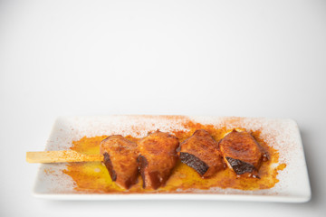 skewer, octopus with paprika, typical tapa in galicia spain