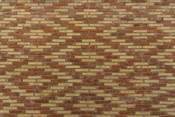 Traditional Spanish brick wall pattern, background, and texture
