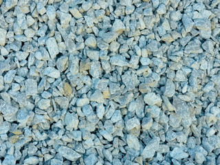 Small stone gravel texture background. Gray gravel pebbles stone texture, seamless texture