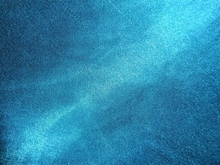 Texture tissus satin bleu.