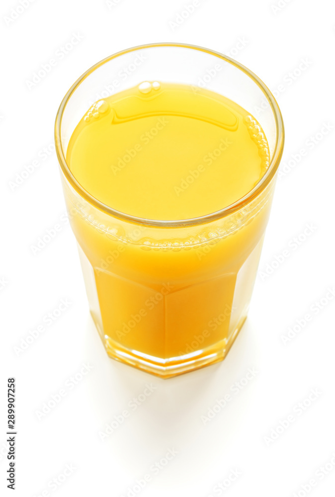 Wall mural glass of orange juice isolated on white