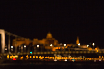 blurry lights of a big city at night. Background for travel photos. bokeh advertising poster