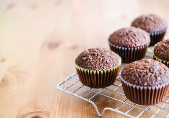 Chocolate cupcakes background.