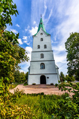 Fototapeta premium The Dobele Evangelic Lutheran Church built in 1495, Dobele, Latvia in sunny summer day